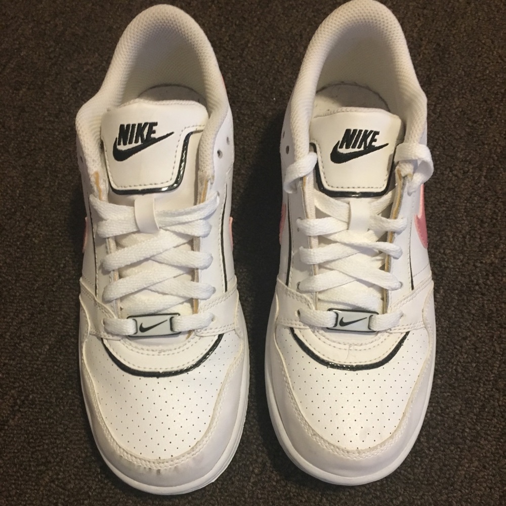 Pink and white Nike shoes !